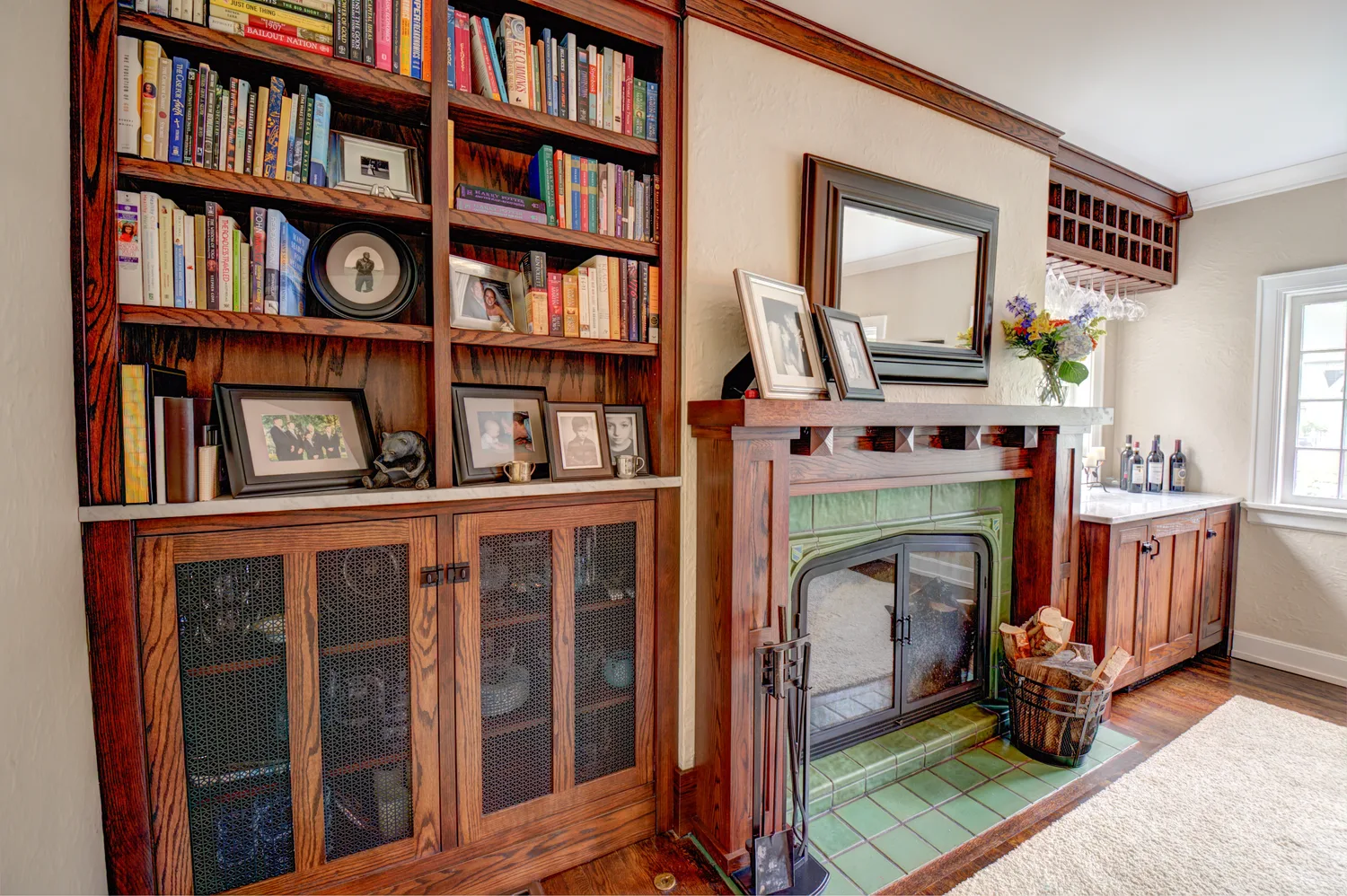 Oak built-in with a tiled surround in a finished lounge