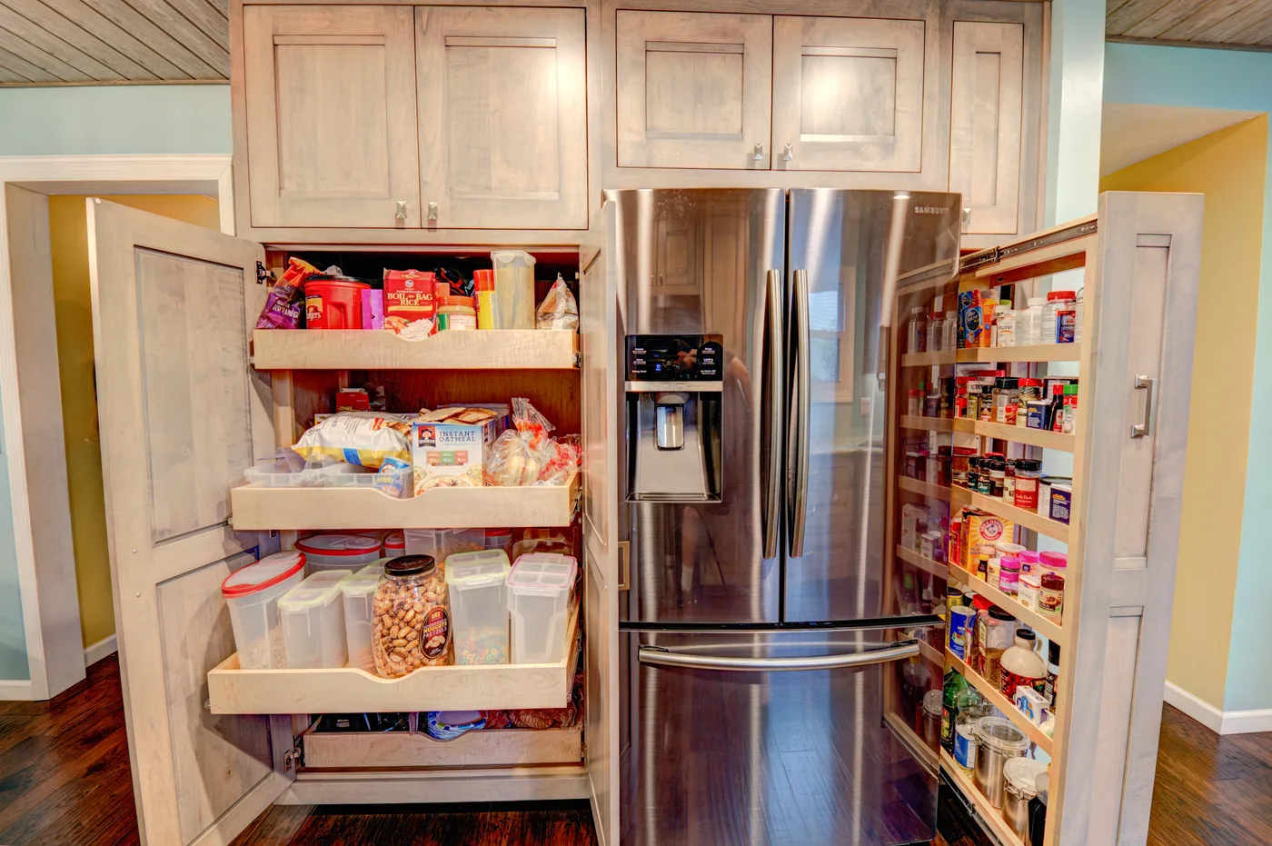 Pantry cabinet with pull-out shelving